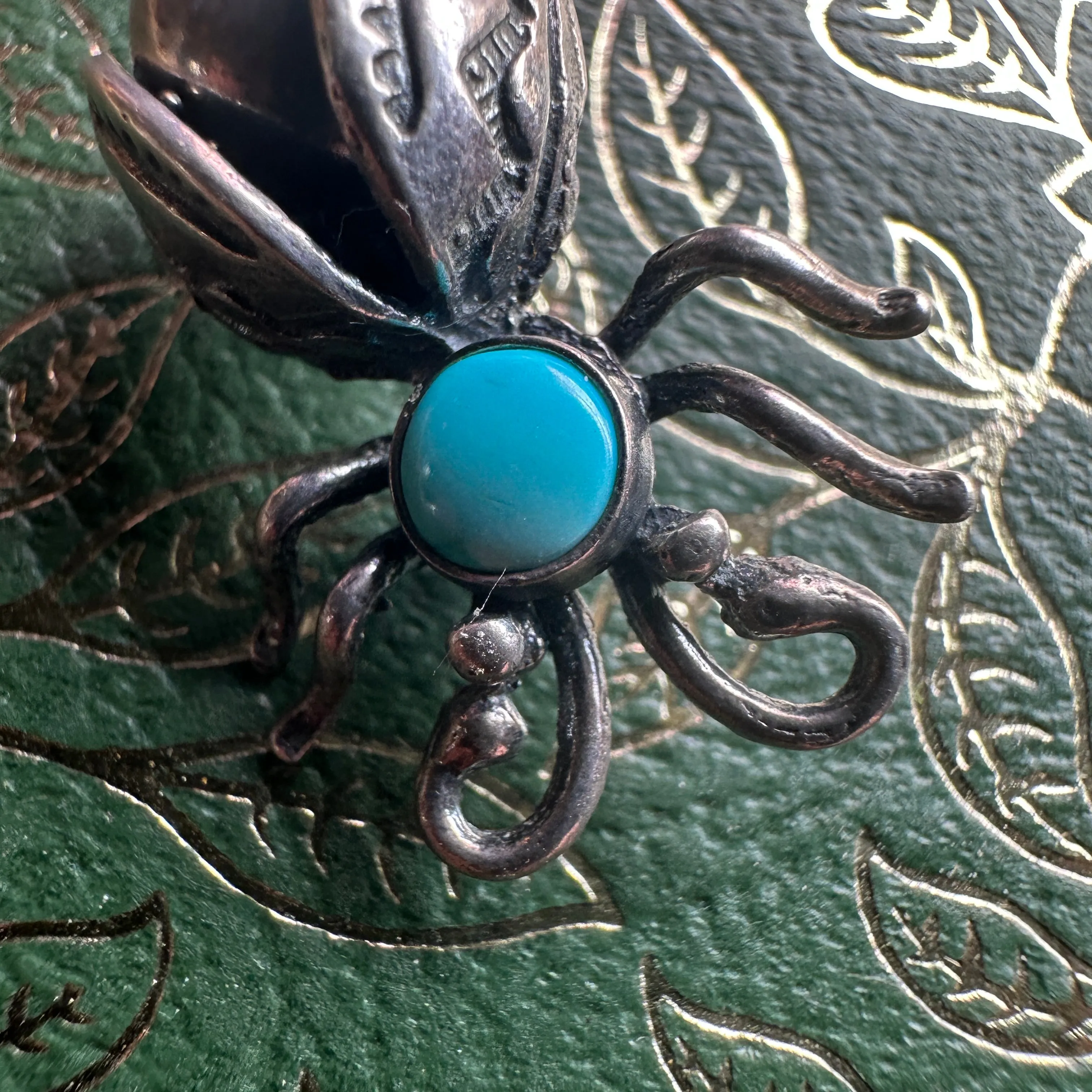 vintage sterling silver and turquoise Navajo firefly brooch